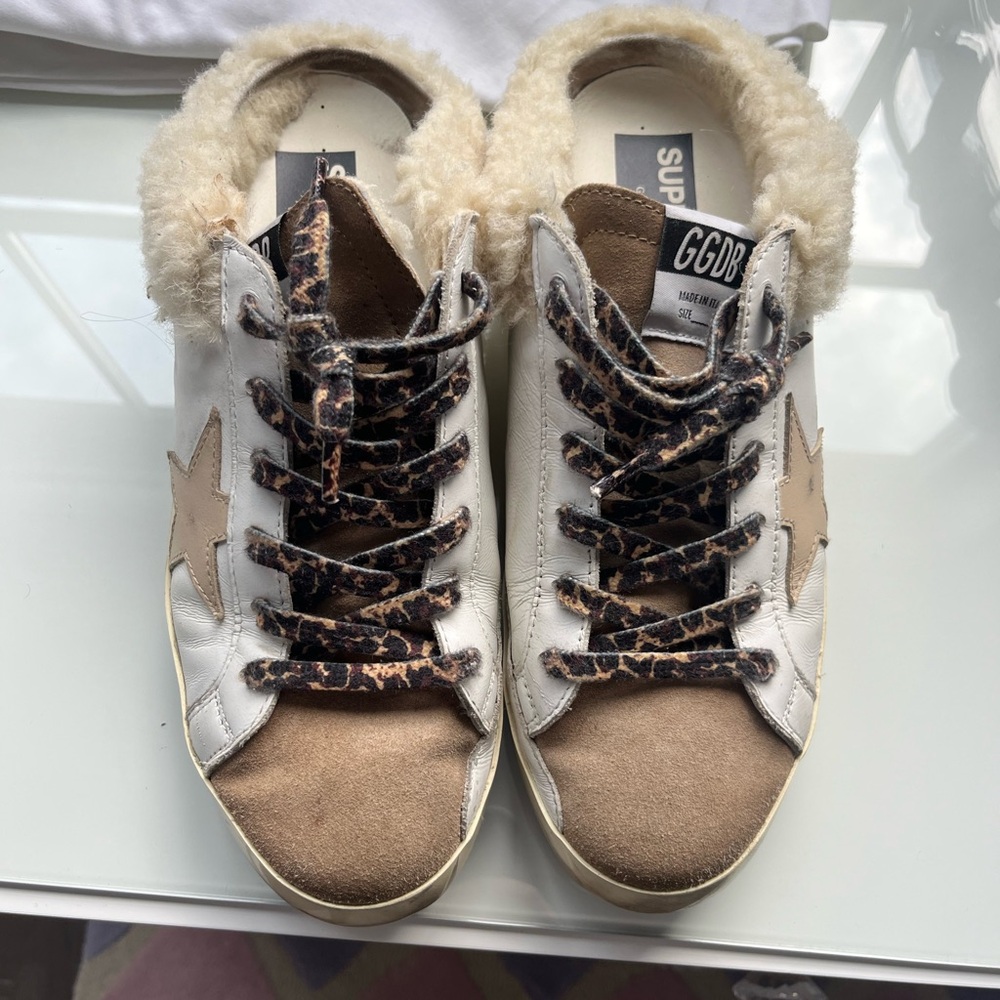 Size 41 golden goose slides with fur great condition. W/BOX Original price $1025